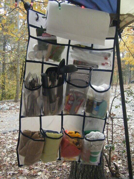 Use a shoe organizer to store and organize your camping kitchen.