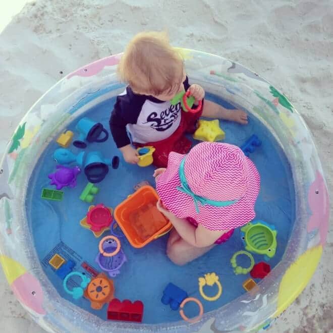 Let kids safely enjoy the water in their own beach pool. The ultimate mom beach hack.