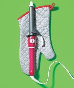 Travelling with a curling iron? Take an oven mitt to prevent burning your clothes.