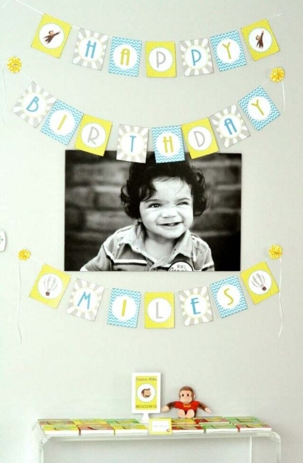 The Birthday Banner at this Curious George Party was too cute