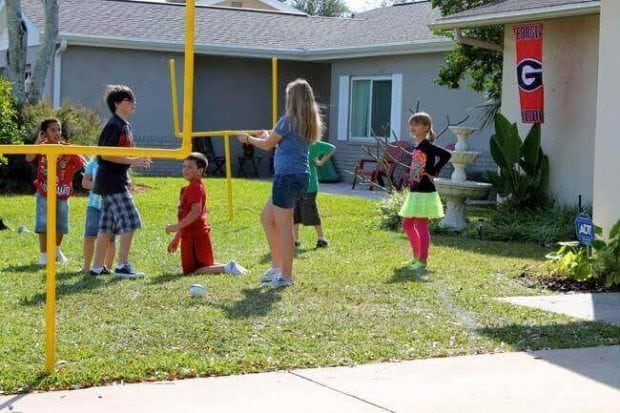 The whole family can play backyard football at your next Super Bowl party with this DIY mini-football field.