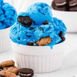 scoops of Cookie Monster ice cream in a white bowl