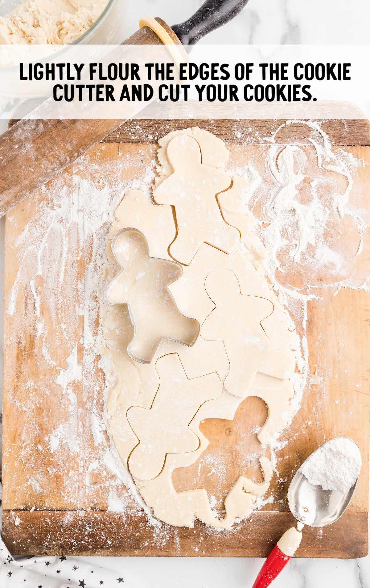 Gingerbread Man Sugar Cookies process shot of dough cut out with a cookie cutter