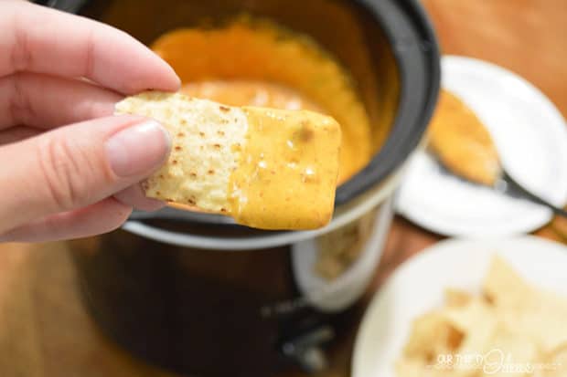 Made in a crockpot, your guests will love this chili con queso.