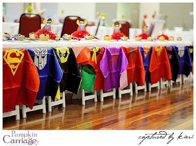 superhero themed birthday party table setting capes