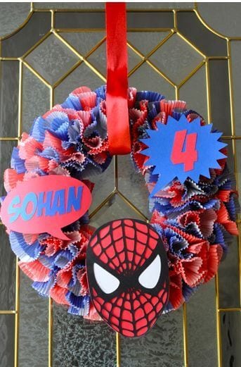 This fun Spiderman Cupcake Liner Wreath is festive and easy to make.