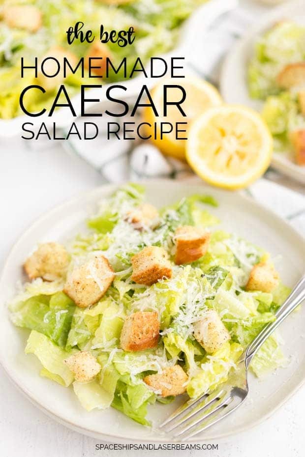 A plate of food, with Caesar salad