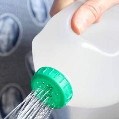 Make your own watering can from a milk jug!