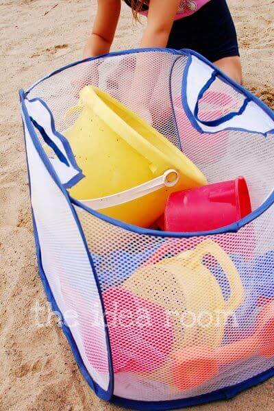 Use a mesh bag to store toys, to make sure the toys come home, but leave the sand by the ocean.