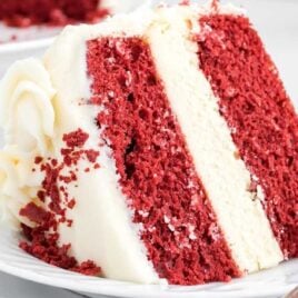 close up shot of a slice of Red Velvet Cheesecake on a plate