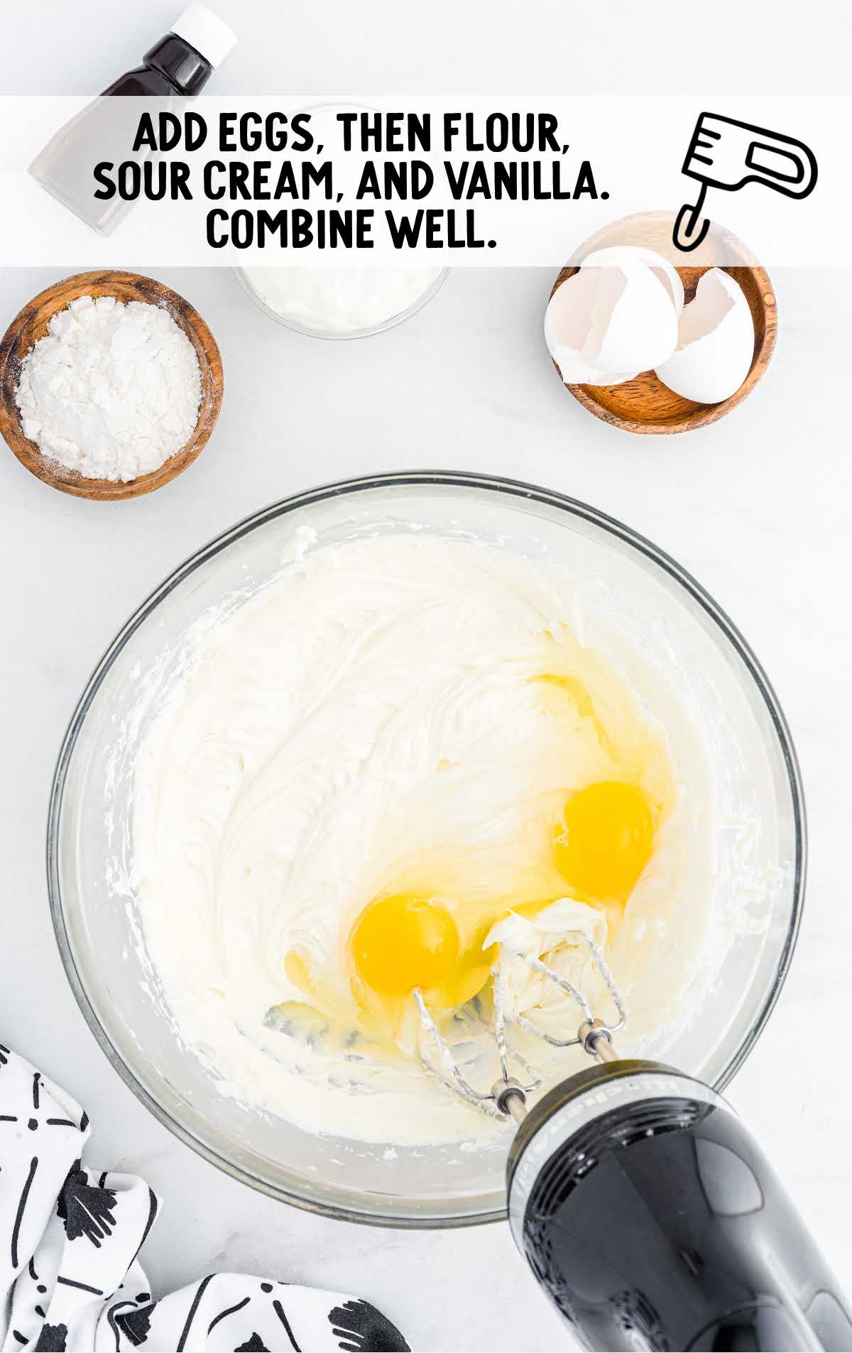 eggs, flour, sour cream, and vanilla blended together in a bowl