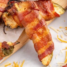 close up shot of Bacon-Wrapped Jalapeño Poppers on a plate