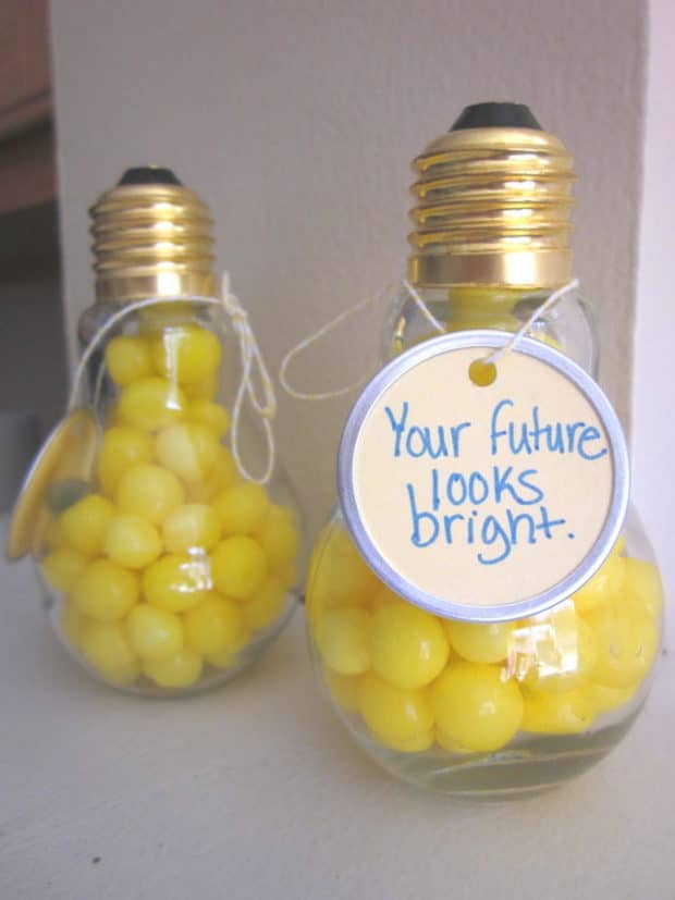 A glass cup on a counter, with Idea and Party favor