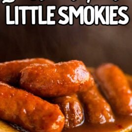 close up shot of Instant Pot Little Smokies on a large wooden spoon