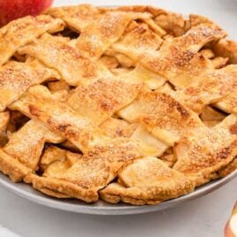 close up shot of a whole Apple Pie Recipe in a baking dish