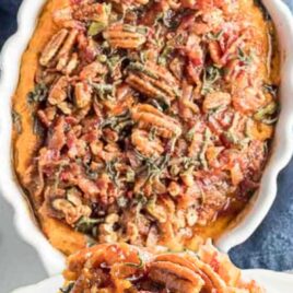 a close up shot of a piece of Sweet Potato Casserole with Pecans on a plate and a overhead shot of Sweet Potato Casserole with Pecans in a bowl