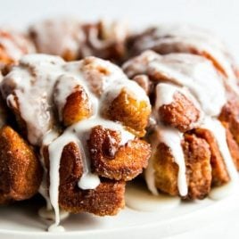 A piece of cake on a plate, with Bread and Cinnamon