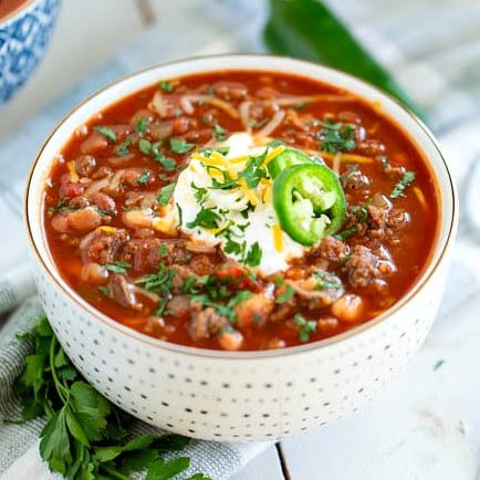 A bowl of food, with Bean and Beef