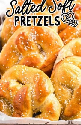 close up shot of homemade soft pretzels topped with kosher salt in a basket