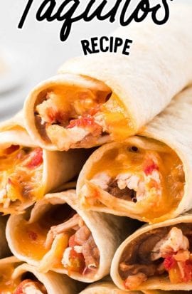 close up shot of taquitos piled on top of each other