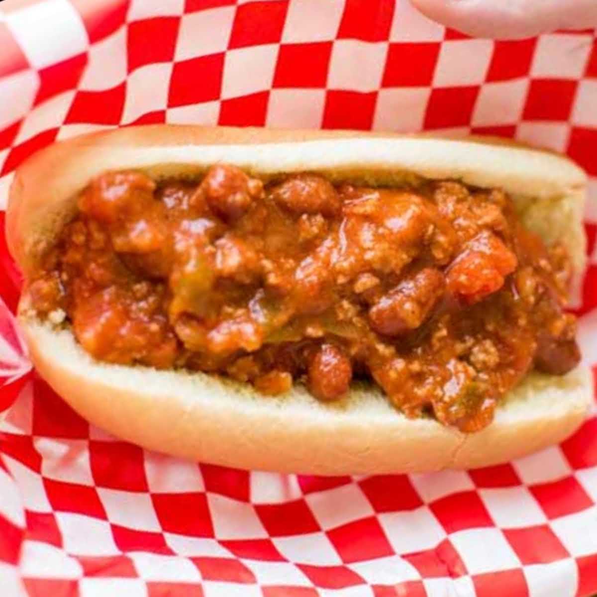 overhead shot of a hot dog topped with chili
