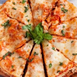 overhead shot of slices of lasagna garnished with parsley