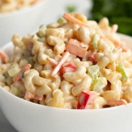 A close up of pasta in a bowl, with Macaroni and Salad