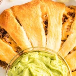 close up overhead shot of Taco Ring with guacamole dip