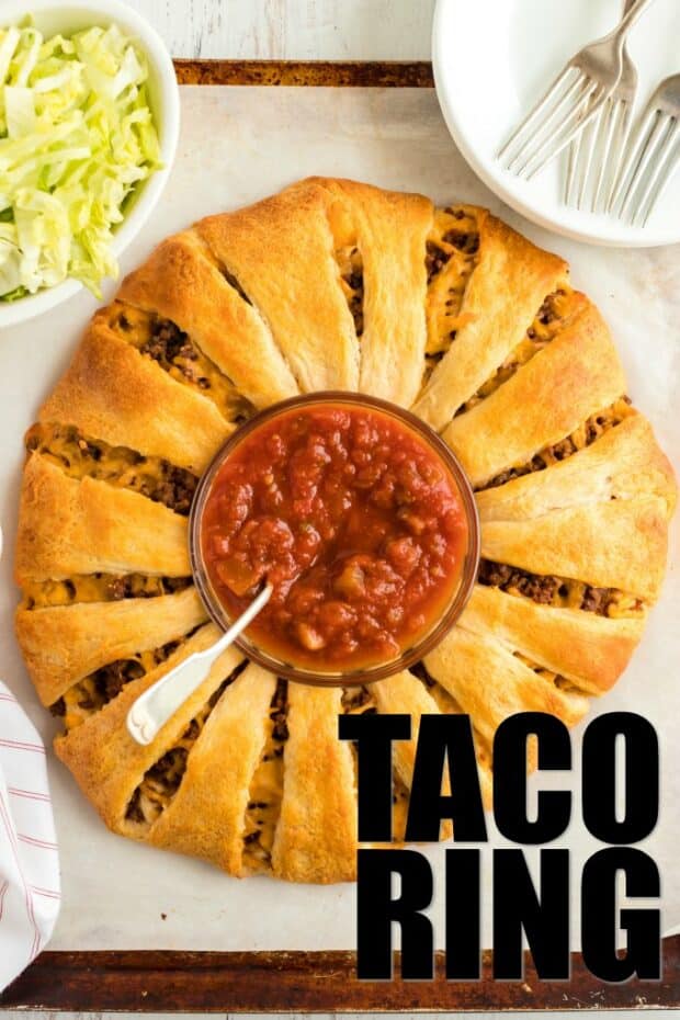 A plate of food with a slice of pizza, with Taco and Salsa