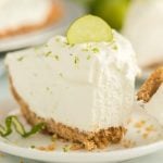 A close up of a piece of cake on a plate, with Key lime