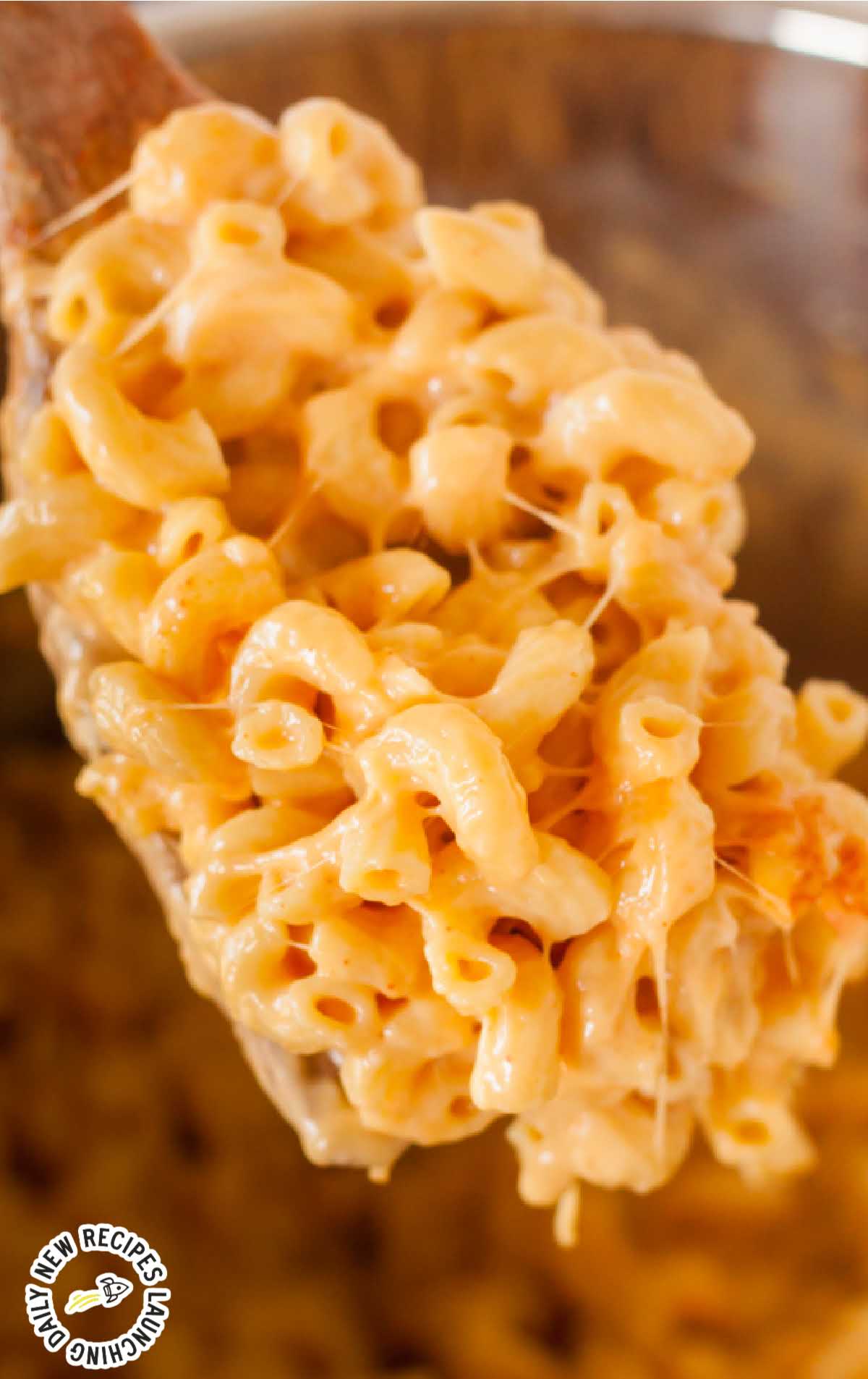 a close up shot of a fork with a piece of Instant Pot Mac and Cheese