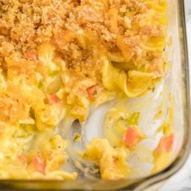 close up overhead shot of chicken casserole in a clear dish