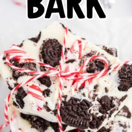 close up overhead shot of Oreo Peppermint Bark piled on top of each other and tied together with a ribbon
