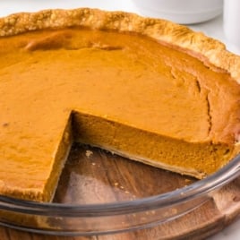 a Pumpkin Pie with a slice missing