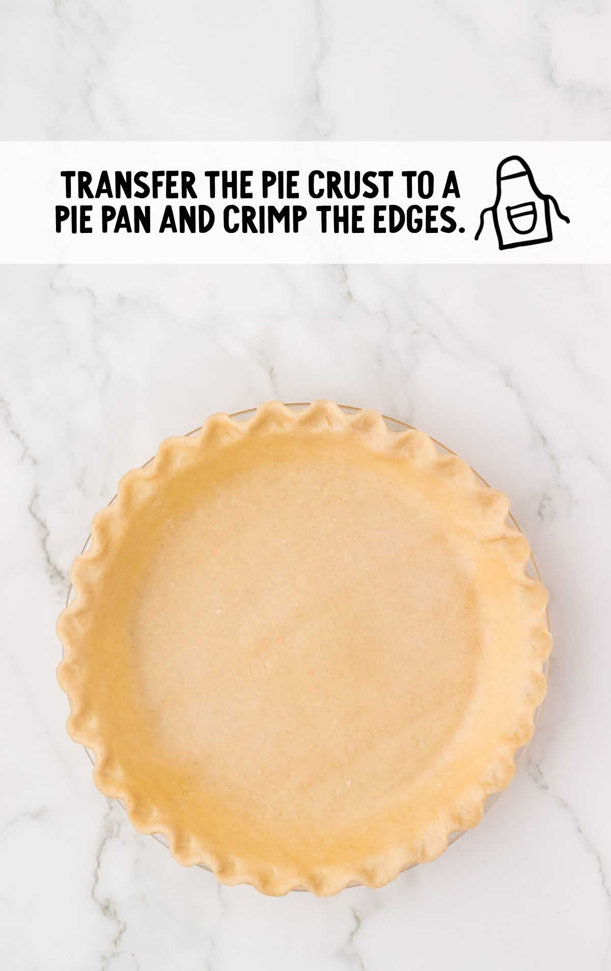 pie crust placed in a pie pan and the edges crimped