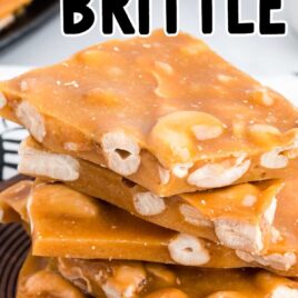close up shot of stacked Cashew Brittle on a plate