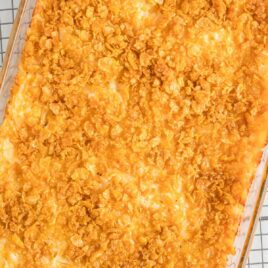 close up overhead shot of Cheesy Potato Casserole in a baking dish