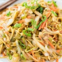 A dish is filled with food, with Chow mein