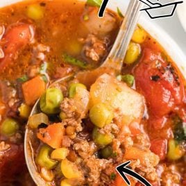 close up overhead shot of a bowl of Hamburger Soup with a spoon