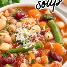 Pinterest graphic with text “Easy Minestrone Soup – Out-of-this-world delicious!” over a bowl of soup filled with colorful vegetables and pasta.
