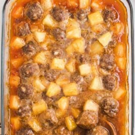 a baking dish of Sweet and Sour Meatballs