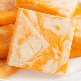 close up shot of a plate of Creamsicle Fudge