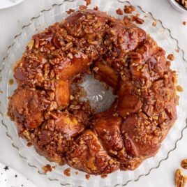 overhead shot of Bread topped with glaze and pecans