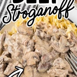 close up overhead shot of a bowl of Beef Stroganoff with a fork