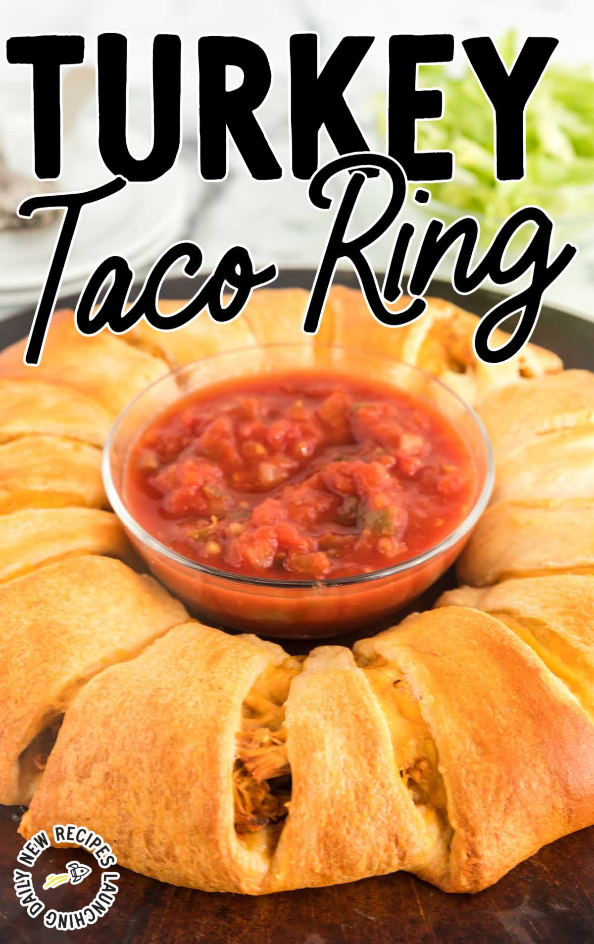 close up shot of a Turkey Taco Ring with a bowl of salsa in the middle