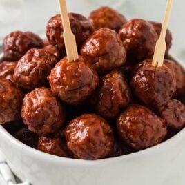 close up shot of a bowl of Grape Jelly Meatballs