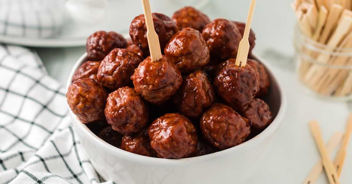 close up shot of a bowl of Grape Jelly Meatballs