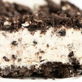close up shot of a slice of Easy Frozen Oreo Dessert on a plate