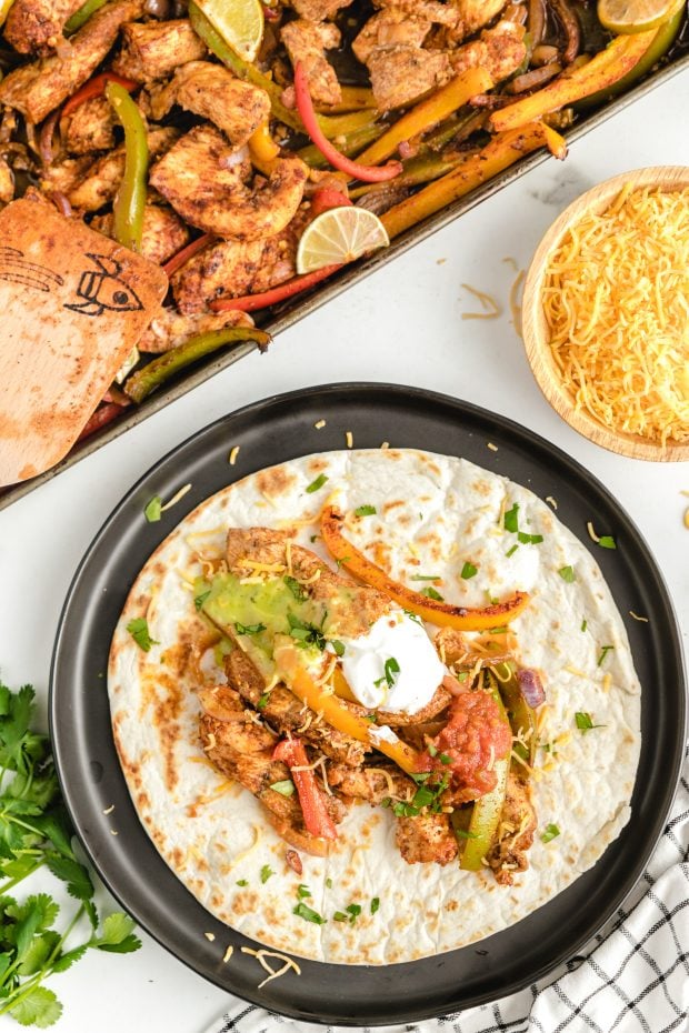 A plate of food, with Fajita and Rice
