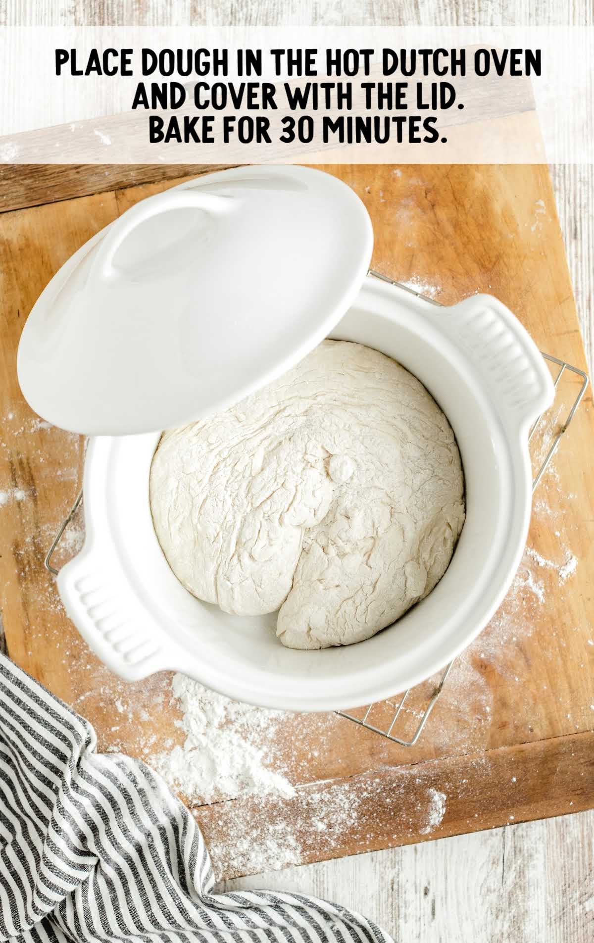 bread dough placed in a dutch oven